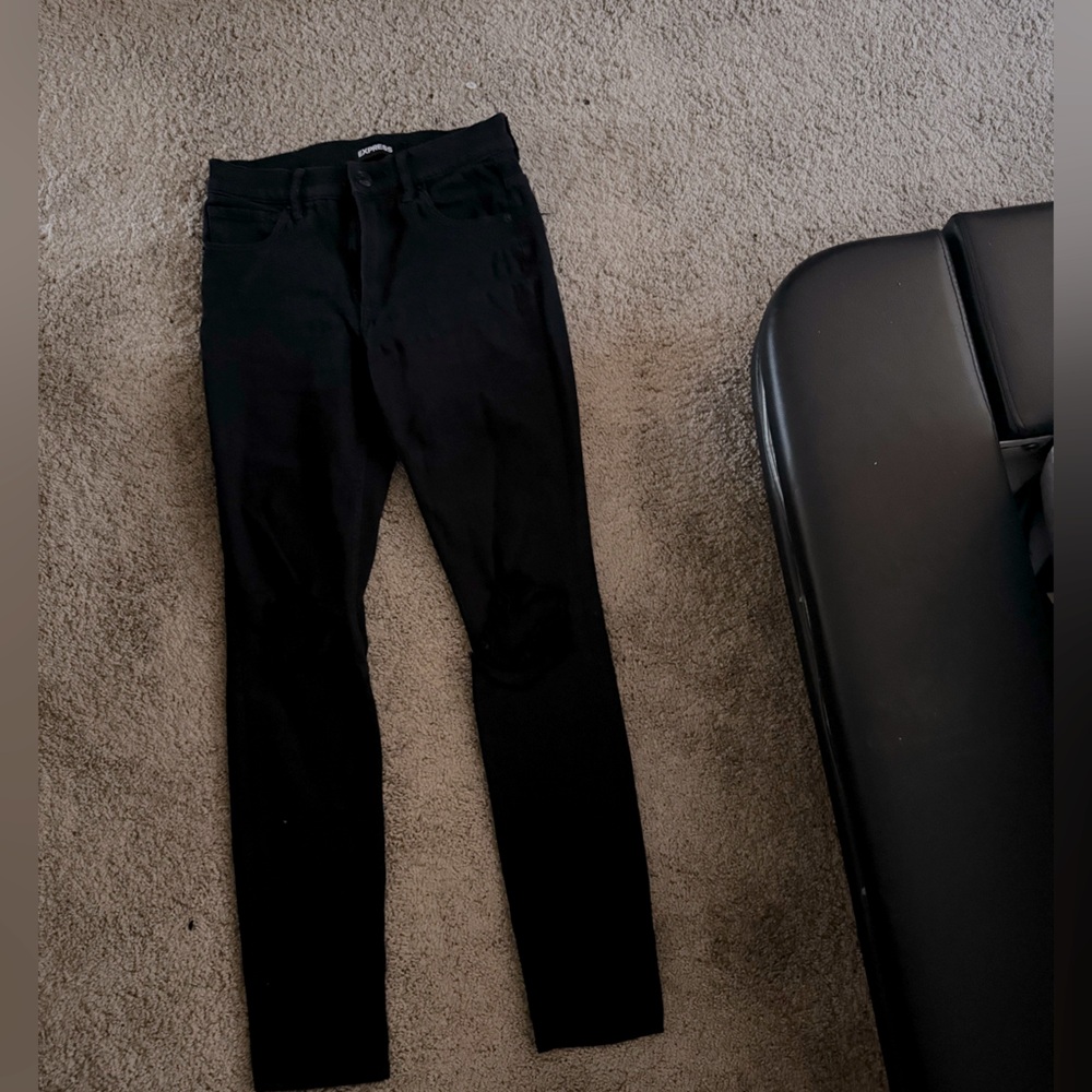 Express black skinny jeans 
Distressed